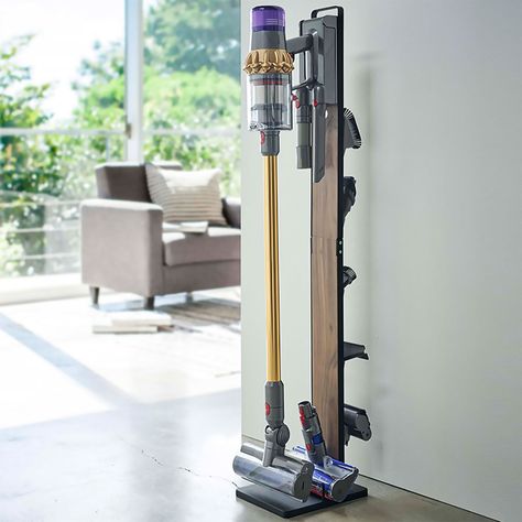 Dyson Accessories Storage, Dyson Stick Vacuum Storage Ideas, Cordless Vacuum Storage Ideas, Dyson Vacuum Storage Ideas, Vacuum Storage Ideas, Dyson Stick Vacuum, Upstairs Apartment, Bookshelves For Small Spaces, Dyson Cordless Vacuum