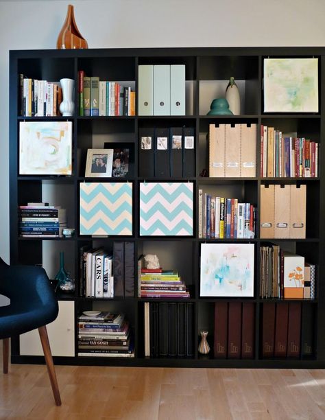 Use painted canvas squares to cover sections of the shelf, via danslelakehouse.com | 9 Easy Ways To Hide Clutter On Shelves Ikea Expedit Hack, Expedit Hack, Ikea Expedit Bookcase, Popular Kitchen Designs, Ikea Kallax Hack, Ikea Expedit, Ikea Bookshelves, Ikea Shelves, Regal Design