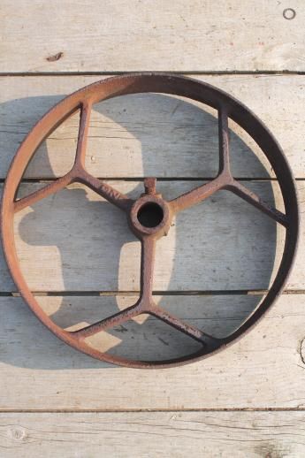 Iron Wheels Repurposed, Giant Wheel Aesthetic, Antique Farm Equipment, Antique Farm Tools, Old Grist Mill Water Wheels, Industrial Machinery, Vintage Gardening, Laurel Leaves, Steel Wheels