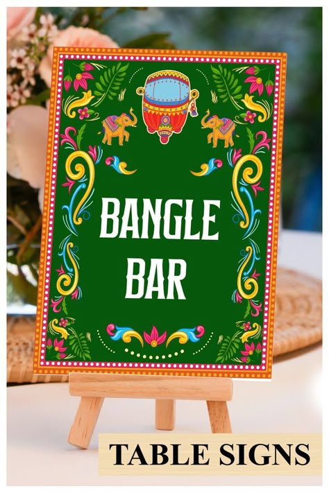 This beautiful Bangle station sign or Indian wedding decor sign with mandala, from our Ethnic Fusion collection, lovingly created by us, is for those who would like to leave, not only a subtle, but also an impactful impression on their guests!

Bangle station signs Bindi Bar signs, Bindi station sign Bangle bar sign Mehndi decoration, Mehndi decor as Haldi decor & Food station sign Food Station Signs, Henna Station, Mehendi Decoration, Indian Diy, Mehndi Decoration, Bangle Bar, Stall Decorations, Bangle Ceremony, Diy Henna