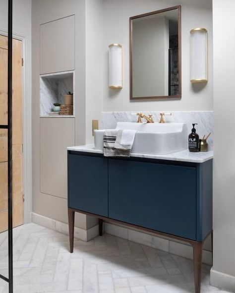 Chantel Elshout Studio on Instagram: "Our clients asked for a grown up, luxurious bathroom, so that’s exactly what we gave them. ​​​​​​​​ ​​​​​​​​ We teamed the Spatialfields basin from @claybrookstudio with a honed Carrara Marble worktop and splashback, Prussian Blue Vanity and brushed brass accents. Such a beautiful combination. ​​​​​​​​ ​​​​​​​​ Tumbled Calacatta Herringbone Tiles from @mandarinstoneofficial​​​​​​​​ Spitalfields basin from @claybrookstudio ​​​​​​​​ Brushed brass taps from @le Marble Worktop, Herringbone Tiles, Brass Taps, Bathroom Loft, Wet Room Flooring, Glazed Brick, Blue Vanity, Brick Tile, Herringbone Tile