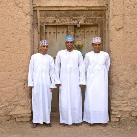 Omani Men in traditional clothing - photo by David Steele, via dreamstime; at the ruins of Birka Al Mouz in the Nizwa area of Oman; wearing a Dishdasha and Kimma (cap) Men In Traditional, Men Editorial, Sultanate Of Oman, Muslim Style, Muslim Men, Mens Editorial, The Ruins, People Talk, Traditional Dress