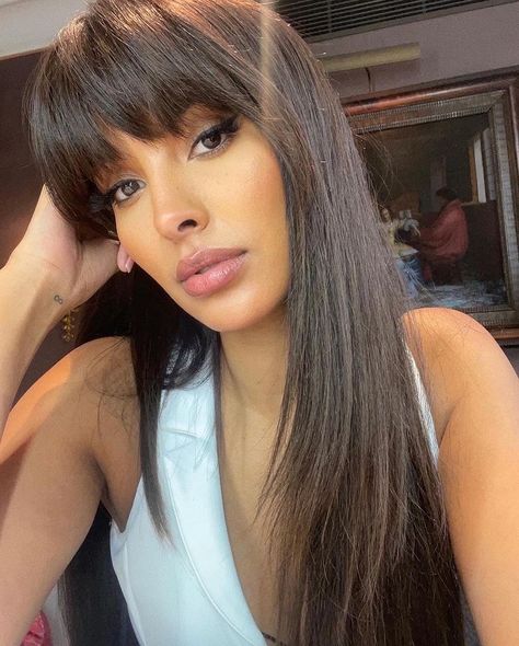 Maya Jama on Instagram: "We named the fringe “Trisha”" Maya Jama Hair, Straight Across Bangs Long Hair, Hair Fringe Styles, Bangs Hair Color, Full Fringe Hairstyles, Heavy Bangs, Island Hair, Hair Toppers For Women, Fringe Styles