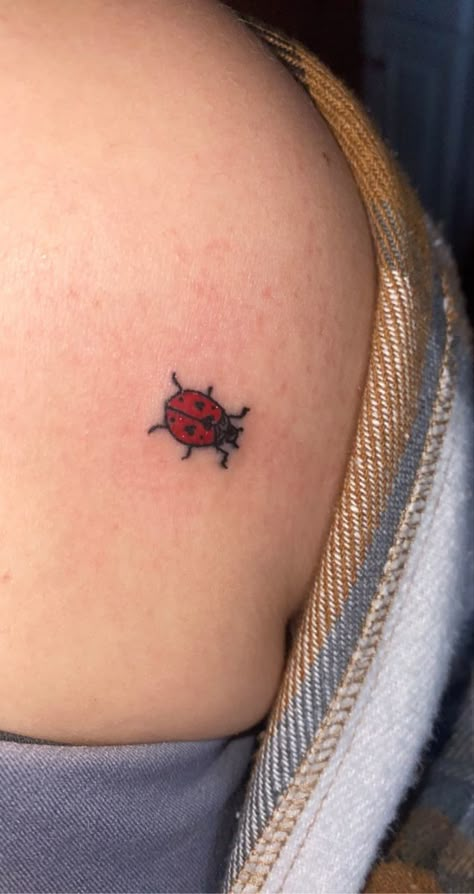 small ladybug tattoo on collarbone/ shoulder area Small Ladybug Tattoo, Tattoo On Collarbone, Hairline Tattoos, Ladybug Tattoo, Small Shoulder Tattoos, Lady Bug Tattoo, Funky Tattoos, Bug Tattoo, Cute Tiny Tattoos