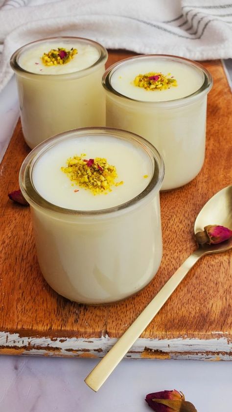 Mahalabia, also known as Muhallebi, Muhalabia, Mhalabia, Mahalebi, Mohallabiah, or Muhallabiyeh is a popular Middle Eastern milk pudding made with milk, corn flour, sugar, and flavored with rose water. Muhalabia Recipe, Muhalabia Dessert, Mahalabia Recipe Desserts, Mahalabia Recipe, Lebanese Desserts Recipes, Middle Eastern Breakfast, Eid Dessert Recipes, Middle Eastern Dessert, Middle Eastern Sweets