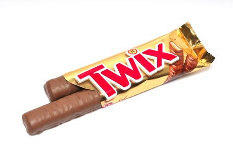 CANDY lovers have discovered the inspiration behind one of today’s most iconic treats. The brand itself confirmed their suspicion in a brief Twitter exchange. Twix, a pair of shortbread bars covered in caramel and milk chocolate, has one of the shortest and succinct names in candy history. Despite its 56-year existence, many fans have wondered […] Twix Chocolate, Twix Bar, Shortbread Bars, Chocolate Brands, Christmas Gifts For Friends, Names With Meaning, Milk Chocolate, The Meaning, Candy Bar