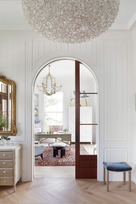 See How Jenny Keenan Designed Her Parents' Forever Home in South Carolina | Southern Living Estilo Charleston, Glass Pocket Door, Arched Doorway, Arch Doorway, Charleston Homes, Arched Doors, Chic Spaces, Mount Pleasant, Entry Way