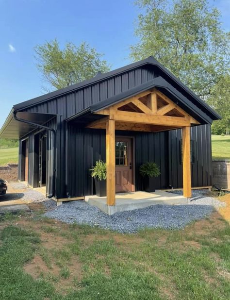 Small Shed Cabin Ideas, Black Shed With Wood Accents, Metal Siding Shed, Small Black Metal House, Black Metal Building With Cedar, Black Metal Commercial Building, Metal Building Ideas Garages, Simple Black Barndominium, Small Garage Ideas Exterior