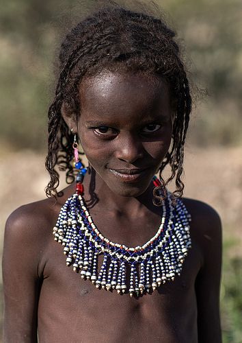 Portrait of an afar tribe girl with a beaded necklace, Afar region, Mile, Ethiopia | by Eric Lafforgue Afar Tribe, African Tribe, Eric Lafforgue, Blonde Braids, Cool Braid Hairstyles, Crochet Braids Hairstyles, African People, Cool Braids, African Braids