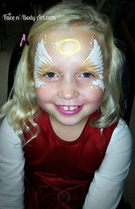 Angel face painting# by shawna del real Face Painting Angel, Angel Face Painting, Xmas Face Painting, Christian Face Painting, Angel Face Paint, Face Paint Christmas, Eye Face Painting, Bodysuit Tattoos, Christmas Face Painting