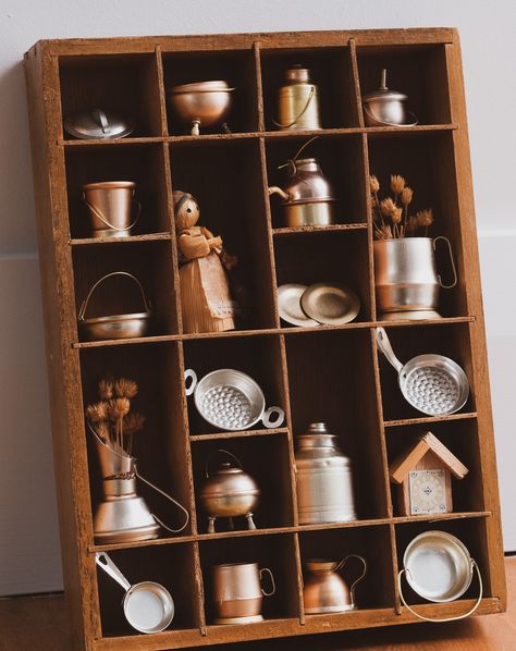 Vintage Miniatures in shadowbox. This folk art piece is from the 1960s/70s and is in perfect condition - I only removed it from its original plastic for the photographs. It features replicas of the wee copper and brass miniatures. • $55 • 17cm x 30cm x 4cm • Nelson pick up • NZ shipping (message for quote) @the.workers.cottage ANTIQUE & VINTAGE • FURNITURE & CURIOSITIES #workerscottage #nelsonnz #nzvintage #nzantiques #cottagecoreaesthetic #nzcottagecore #folkart #vintage #shadowbox #b... Miniature Curiosity Cabinet, Vintage Printers Tray, Miniature Cabinet Of Curiosities, Miniature Apothecary Cabinet, Workers Cottage, Snuff Boxes Antiques, Cottage Core Aesthetic, Vintage Miniatures, Copper And Brass