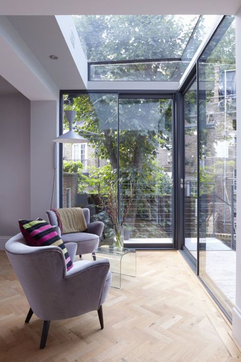 34 Stunning Glass Extension Ideas For Maximize Natural Light | HomeMydesign Small Conservatory Interiors, Glass Room Extension, Small Conservatory, Glass Wall Design, Conservatory Interior, Garden Room Extensions, Townhouse Interior, London Townhouse, Room Extensions