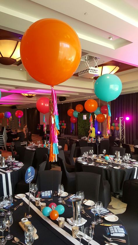 Beautiful bold colours with these tassel balloons. Party Ceiling Decorations, Inexpensive Centerpieces, Huge Balloons, Balloon Ceiling, Bar Mitzvah Party, Ideas Fiesta, Balloon Tassel, Blacklight Party, 50th Bday