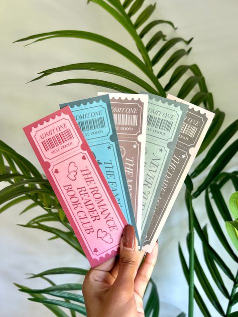 Ticket Bookmarks| Romamce, Fantasy, Mystery And Never Judge A Book By Its Movie Ticket Bookmark For Bookish Gifts ⭐️Bookmark size is 2x6 inches. Made with card stock paper and laminated! ⭐️PLEASE NOTE! Bookmarks are shipped in an envelope using a partial letter mail tracking system. Tracking updates may take time to update and may even say "delivered" but the item may not be delivered until the next day or two. Follow me for more! Instagram- simplyrdesigns  *Please contact me with further questi Paint Swatch Bookmark, Book Themed Bookmarks, Bookmark Graphic Design, Cricut Bookmark Ideas, Bookmarks Aesthetic, Craft Night Party, Bookish Bookmarks, Ticket Bookmark, 2024 Illustration