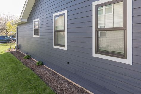 James Hardie Plank Siding in Deep Ocean with Black Andersen 100 Series Windows! Installed by Opal Enterprises! Navy Vinyl Siding House, Blue House With Black Windows, Blue House Exterior White Trim, Blue House Black Windows, House Exterior White Trim, Navy Blue House Exterior White Trim, Houses With Black Windows, Navy Blue House Exterior, Blue House White Trim