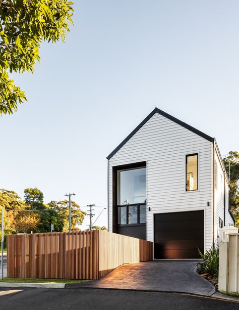 Barn by James Hardie • A contemporary take on traditional Nordic architecture, Barn by James Hardie – one of seven housing design styles identified in the company’s Modern Homes Forecast 2024 – is stunning in its simplicity.  #jameshardie #nordichomes #nordicarchitecture #homebuilders #suburbanhomes #houseconstruction #australianhomes #houseinspo #amazinghomes #timbercladding #architecturelovers #scandinavianhomes Garage Front Of House, Cladding House Exterior, Modern Windows Exterior, Extension Exterior, Barn Architecture, Modern Barn Style, Nordic Architecture, Dark Window, Weatherboard House