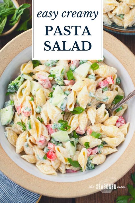 Full of fresh, flavorful ingredients, this easy pasta salad recipe is a popular side dish for picnics, potlucks, and cookouts. The creamy cold pasta salad starts with a bright, smooth dressing made with mayo, lemon, fresh basil, and garlic. Perfect for summer entertaining! Creamy Pasta Salad Recipes Cold, Pasta Salad Recipe Mayo, Pasta Salad Recipes With Mayo, Mayo Pasta Salad, Creamy Pasta Salad Dressing, Easy Cold Pasta Salad Recipes, Pasta Salad With Mayo, Easy Cold Pasta Salad, Creamy Pasta Salad Recipe