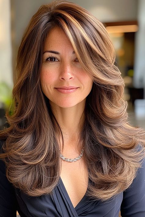 Feathered Layers with Subtle Highlights, layered haircut for women over 40 Feathers Haircut For Long Hair, 80 Cute Layered Hairstyles, Layered Feathered Hair, Dark Hair Long Layers, Long Feathered Hairstyles, Feathered Hairstyles Long, Textured Layers Medium Hair, Feathered Curtain Bangs, Highlights With Layers