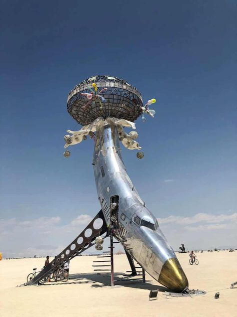 A sculptural airplane stands in the playa close to Black Rock City Rock Style Men, Burning Man Art, Burning Men, Black Rock Desert, Nevada Desert, Burning Man Fashion, Black Rock City, Dust Storm, Rock City