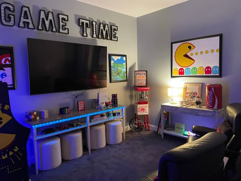 Every family with children or grandchildren need a fun but organized game room. Game Den Room, Game Room Playrooms, Game And Guest Room Ideas, Boys Video Game Playroom, Game And Music Room, Playroom And Game Room Ideas, Guest Room And Game Room Combo, Game Media Room Ideas, Family Gaming Room Ideas