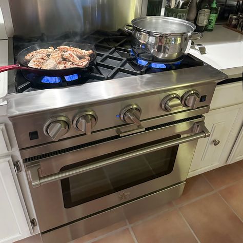 Colors to make a statement and stainless for a classic look. Claire, from our Hyannis sales team, shows off her home's @bluestarcooking gas range with open burners. She loves the control it gives her when cooking, especially for stir fry, and says it's a work horse! Ask us about cooking with BlueStar and how you can customize colors to create the kitchen of your dreams! Cook In Kitchen, Kayley Cuoco, Brick Oven, Gas Cooker, Aesthetic Kitchen, Samsung Products, Kitchen Stove, Baked Donuts, Gas Range