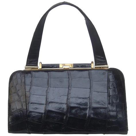 Sleek Ebony Alligator Leather Vintage Handbag ca 1960 For Sale at 1stDibs Cage Bag, Alligator Handbags, Crocodile Handbags, Black Alligator, Retro Handbags, Alligator Skin, Chloe Handbags, Patent Leather Handbags, Suede Handbags