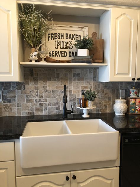 Farmhouse sink, backsplash, and above sink decoration. Kitchen Sink Wall No Window Ideas, Decorating Above Kitchen Sink No Window, Wall Above Kitchen Sink No Window, Sink With No Window Ideas, Above Sink Wall Decor, No Window Over Sink Ideas, Wall Decor Above Kitchen Sink, Shelf On Side Of Kitchen Cabinet, Above Sink Kitchen Decor