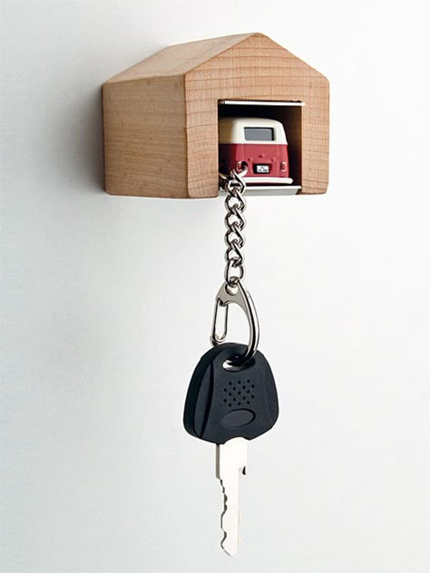 A good example of simple gamification. The garage is a natural home for the car on your key holder, it is a reminiscence of your childhood games, which makes you want to park your car even more. Wooden Key Holder, Wooden Garage, Car Key Holder, Holder Design, Vw Bus, Ikea Hack, Car Keys, Key Holder, Cool Gadgets