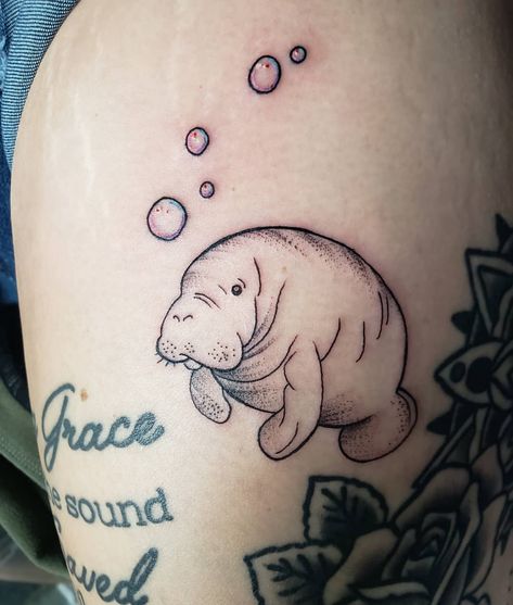 Amber Wilhelm | #manatee #manateetattoo #girlswithink #htxtattoo #texastattoo | Instagram Manatee Tattoo Ideas, Simple Manatee Tattoo, Manatee Tattoo, Filler Tattoos, Texas Tattoos, Tasteful Tattoos, Manatees, Dream Tattoos, Body Mods