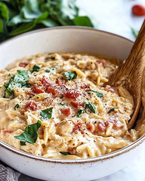 This Slow Cooker Creamy Tuscan Chicken Orzo brings together tender chicken, creamy orzo, and sun-dried tomatoes in a rich, Parmesan-infused sauce. The fresh spinach adds a burst of color and ... Read more Tuscan Crockpot Chicken, Crockpot Orzo Recipes, Crockpot Chicken Orzo, Tuscan Chicken Orzo, Creamy Orzo, Creamy Tuscan Chicken, Creamy Mushroom Chicken, Orzo Soup, Easy Vegetarian Dinner