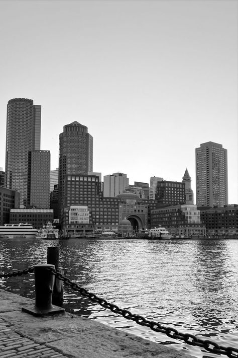 Black and white photo of the Boston Harbor in the foreground, the downtown Boston city skyline in the background just over the water. Boston Aesthetic, Boston Travel Guide, Boston Photography, Boston Restaurants, Boston Skyline, Boston Travel, Photography Poster, Boston Harbor, Black And White Picture Wall