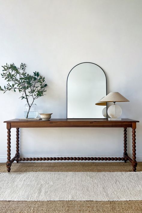 Presenting our recent project: a unique console table featuring sturdy English walnut legs and a top crafted from American black walnut. A special finish enhances the grain patterns. The table was elongated to an impressive 2 meters using parts of an antique table, showcasing sustainable walnut sourced responsibly. Appreciate your trust in this creation. We hope you feel its beauty and craftsmanship as much as we do Custom Console Table, Walnut Timber, English Walnut, Antique Restoration, Wood Turner, American Black Walnut, Antique Table, Antique Inspiration, Black Walnut