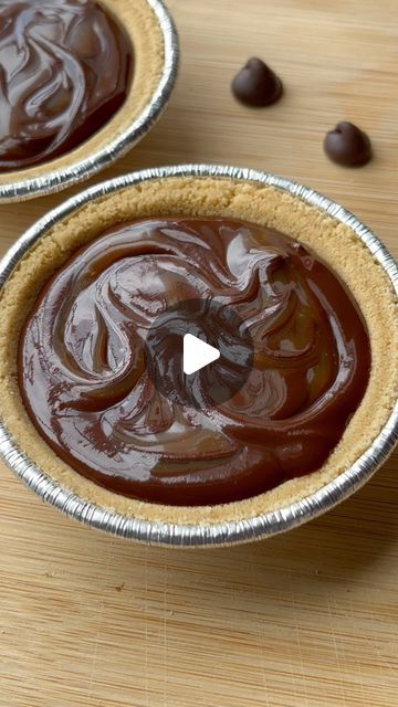 Prajakti Kapade on Instagram: "SALTED CARAMEL CHOCOLATE TART - Eggless and only 5 ingredients ‼️🤌🏻

It’s so indulgent you won’t stop at a bite! It’s a mixture of two best things - CARAMEL and CHOCOLATE!

Recipe: (makes 3 small tarts- 4 inch diameter)
- SALTED CARAMEL SAUCE : Caramelize 1/4 cup of sugar, mix 1/8 cup butter. Then turn stove to low and slowly add 1/2 cup warm heavy cream, and keep stirring till you get this beautiful golden brown color. Finish with a pinch of salt. 
- Pour this sauce over 1/2 cup of dark chocolate ( keep few tsp of sauce aside for topping). Mix this well till chocolate melts.
- VOILA! Pour this delicious salted caramel chocolate ganache in tart shells and top with some salted caramel sauce.
- Set in refrigerator for 3-4 hours and DIG IN ✨‼️

#saltedcaramelc Caramel Chocolate Ganache, Salted Caramel Chocolate Tart, Salted Caramel Tart, Chocolate Melts, Golden Brown Color, Salted Caramel Sauce, Tart Shells, Salted Caramel Chocolate, Caramel Chocolate