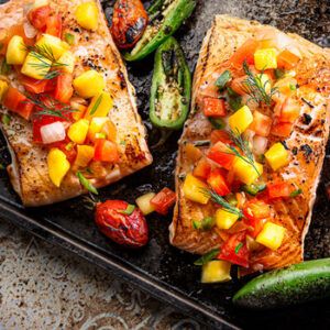 Baked Salmon With Mango Salsa | Recipes | ¡Yo Quiero!™️ Brands Baked Salmon Mango Salsa, Mango Salmon Recipes Baked, Baked Salmon With Mango Salsa, Mango Salmon Recipes, Mango Dishes, Salmon With Mango Salsa, Mango Salmon, Salmon With Mango, Dinner Specials