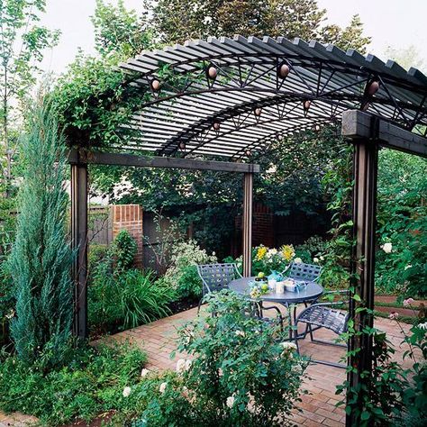 Casual Curves  "-- Short intervals between roof materials equal more shade for the space underneath the pergola.    -- A gentle roof curve provides a departure from the typical horizontal cover of most pergolas.    -- Vines can be trained up columns, but tall, narrow evergreens offer a way to integrate greenery with the vertical elements." Curved Pergola, Diy Bamboo, Small Pergola, Pergola Diy, Steel Pergola, Cheap Pergola, Pergola Swing, Pergola Attached To House, Metal Pergola