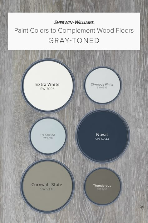 If your wood floors are gray-toned, this palette from Sherwin-Williams can help you pick a wall color to complement them perfectly. Tap this pin to learn why hues like Extra White SW 7005, Naval SW 6244, Cornwall Slate SW 9131, and others can help bring classic charm, bold drama, and more. #sherwinwilliams #woodfloors #graywoodfloors #paint #painting #diy #interiordesign #decor Gray Wood Floors Color Scheme, Barndo Kitchen Ideas Modern, Navy Walls Light Wood Floors, Paint That Matches Dark Wood, Navy Paint Palette Colour Schemes, Classic Blue Paint Colors, Blue Grey Carpet Bedroom, How To Style Gray Floors, Best Master Bath Paint Colors