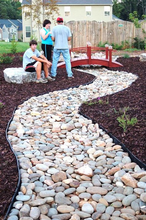 rain water run off problem solved with a gorgeous dry creek bed japanese bridge, landscape, Rain water run off problem solved with a gorgeous dry creek bed Japanese bridge Garden Drainage, Rock Walkway, Florida Gardens, Water Displacement, Yard Drainage, Japanese Bridge, Dry Creek Bed, Dry River, River Rock Landscaping