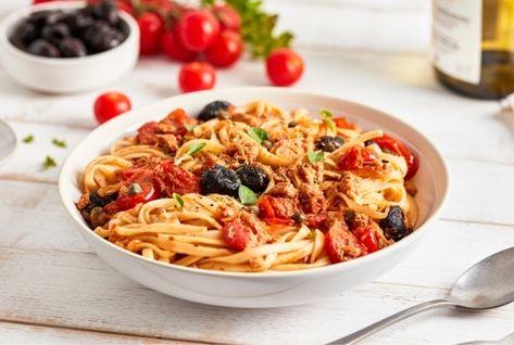 Pasta alla Puttanesca with Canned Tuna (Italy) Tomato Basil Pasta Sauce, Recipes Mediterranean, Mediterranean Foods, Mediterranean Cooking, 31 Daily, Alla Puttanesca, Cherry Tomato Recipes, Pasta Puttanesca, Mediterranean Meals