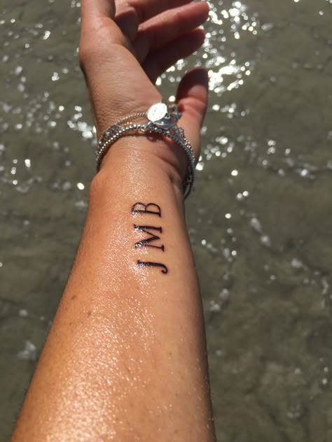 Initial Tattoo Location, Initial Tattoo On Forearm, Tattoos Of Initials, Forearm Initial Tattoo Women, Initial Tattoos Men, Boyfriend Initials Tattoo, Tattooed Initials, Initials Tattoo Men, Kid Initial Tattoo Ideas