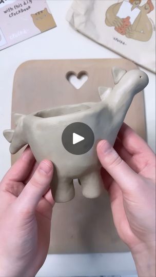 2.3M views · 267K reactions | How cute is this Dino planter! Such an easy way to elevate a pinch pot into something fun and full of character

Pottery wizard @chelseamorganart inspiring us again! 

#clay #pottery #diyclay #diycrafts #diyinspo #potteryinspo #handbuildingwithclay #dinoplanter #athomepottery #dinoplanter #cutediyprojects #crockd | Crockd | Men I Trust · Show Me How (Album V) Dinosaur Pinch Pot, Pinch Pot With Feet Ideas, Pinch Pot Ideas Ceramics Animals, Pinch Pot Ideas Ceramics, Clay Pinch Pots, Make A Dinosaur, Clay Plant Pots, Recycled Art Projects, Cute Diy Projects