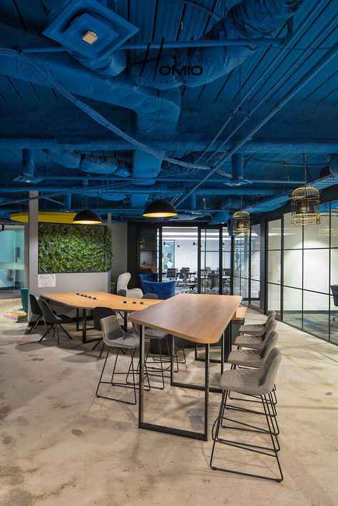 For more Office Decor Interior Ides, visit homiodecor.com #office #furniture #office design #officedecor Exposed Ceiling Office, Exposed Services, Innovation Hub, Industrial Office Design, Cool Office Space, Office Design Inspiration, Modern Office Space, Innovation Lab, Loft Studio