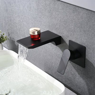 【Easy Operation】Single handle for easy control over temperature and water flow. Finish: Black | LUXSHERY Wall Mount Bathroom Faucet in Black | Wayfair Waterfall Bathtub, Waterfall Tub Faucet, Bathroom Sink Faucets Modern, Wall Mount Faucet Bathroom Sink, Wall Mount Tub Faucet, Modern Basin, Bathroom Faucets Waterfall, Wall Mount Faucet Bathroom, Modern Bathroom Sink