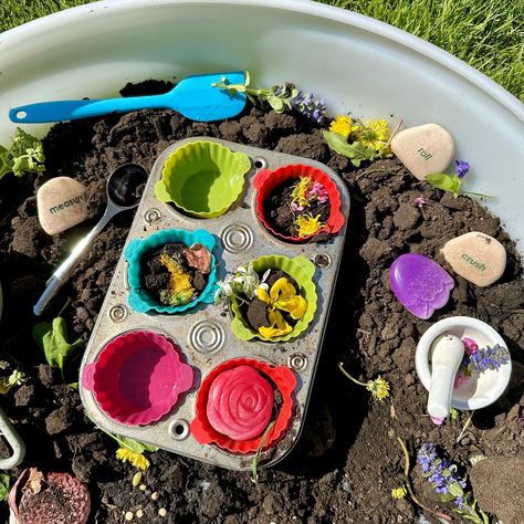 Spring Mud Cakes 🧁🌱 What can your little bakers whisk up in this spring themed mud cupcake invitation 🧁 This is such a fun and easy way to get outside and play in the mud! Go on a nature walk in your local community or backyard with children and collect all kinds of unique and different nature treasures like flowers, blossoms from trees, leaves and more! 🌼 Bring them back to your learning space and place them in a bowl near your deep tuff tray. Then pour in your dirt and mix in water to cre... Mud Cakes, Mud Kitchen Activities Eyfs, Nature Tuff Tray, Mud Kitchen Stone Food, Mud Pie Outdoor Play, Mud Games For Kids, Edible Mud Sensory Play, Rock Food For Mud Kitchen, Cupcake Invitations