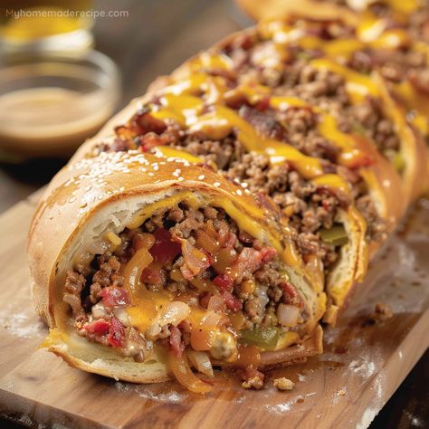 Garbage Bread is a hearty bread roll filled with ground beef, cheese, pickles, and more, wrapped in a golden crust. Serve with Thousand Island dressing. Garbage Bread, Apple Fritter Bread, Grandma Cooking, Bread Ingredients, Recipes Appetizers And Snacks, Entree Recipes, Bread Dough, 1 Pound, Ground Beef Recipes