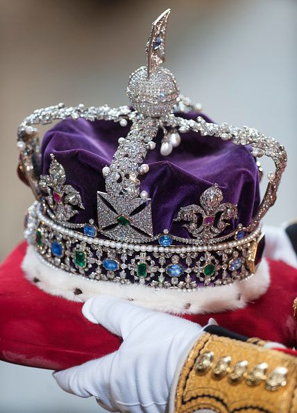 Queen Elizabeth II's crown is prepared before the State Opening of Parliament in the House of Lords at the Palace of Westminster on May 18, 2016 in London, England. Queen Elizabeth Ii Crown, Purple Royalty, Imperial State Crown, British Crown Jewels, Royal Crown Jewels, Royal Crowns, Royal Tiaras, Queen Crown, Horse Drawn