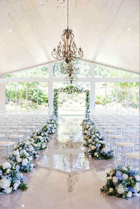 Blue White and purple florals lining the aisle at the (Tate House Wedding) Venue in Jasper Georgia white marble floors natural light wedding inspiration decor Wedding Venues Blue And White, Blue Themed Wedding Decoration, Blue And White Wedding Venue Ideas, Wedding Venue Blue Theme, Wedding Color Light Blue, Dusty Blue And Navy Wedding Theme Wedding Ceremony Decor, Blue Ceremony Decor, Cheap But Classy Wedding Ideas, Floral Wedding Stage Decor