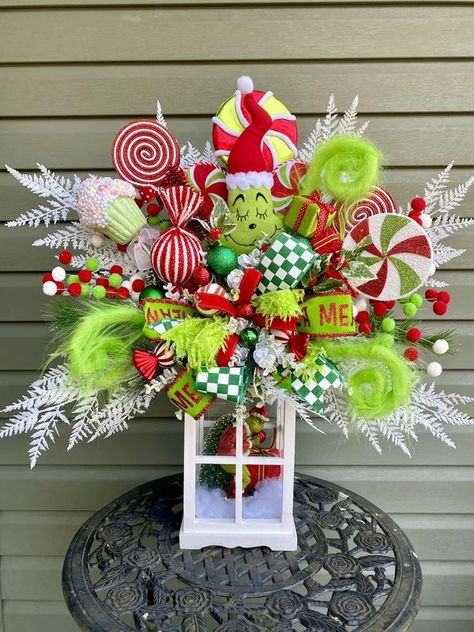 Wreaths & Bows : Inspiration and Ideas by Wreath & Bow Co | Grinch lantern | Facebook Grinch Lantern Diy, Grinch Lantern, Grinch Centerpiece, Candle Globes, Lantern Diy, Grinch Decorations, Christmas Grinch, Diy Lanterns, Christmas Cup