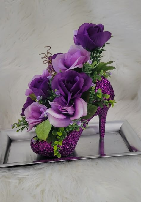 Flower Arrangements In Purses, High Heels Decorations Ideas, Shoe Flower Arrangement, Shoe Flower Arrangement High Heels, Diy Floral Shoes, Shoe Vase, Elegant Flower-shaped Evening Heels, Purple Centerpieces, Unique Flower Arrangements