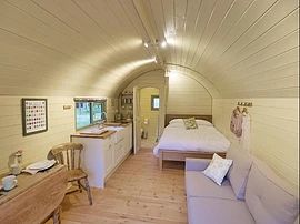 The Shire Pod | My Shire Houses Arched Homes, Glamping House, Underfloor Insulation, Micro House Plans, Camping Pods, Wood Door Frame, Glamping Pods, Camping Pod, Pod House