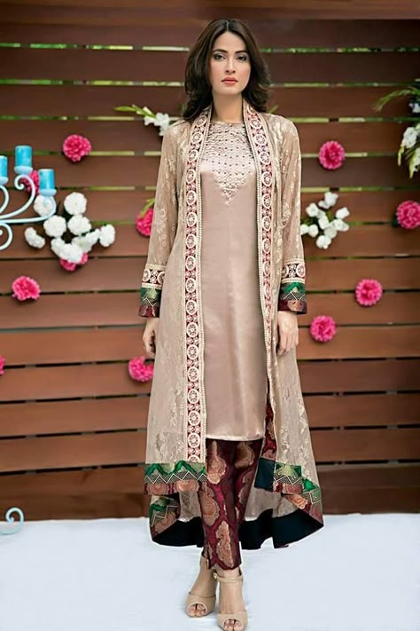 Coat style trouser suit. Custom made availaible at Royal Threads Boutique. To order whatsapp at +919646916105 Double Layered Kurti Designs, Latest Gown Styles, Chifon Dress, Dresses Pakistani, Mode Mantel, Dresses Fancy, Shrug For Dresses, Calf Sleeve, Salwar Kamiz